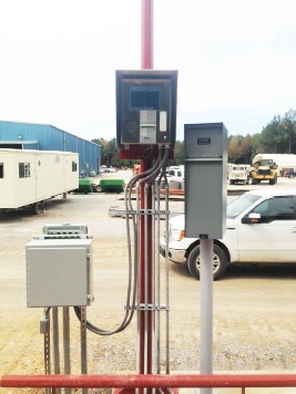 Unmanned truck scale kiosk with remote scoreboard display