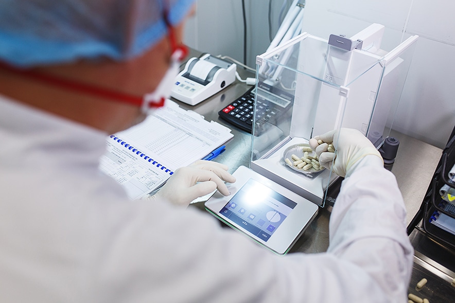 Weighing on a lab balance Weighing on a lab balance