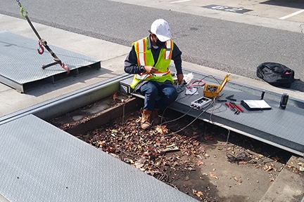 Michelli Weighing & Measurement technician performs a scale repair