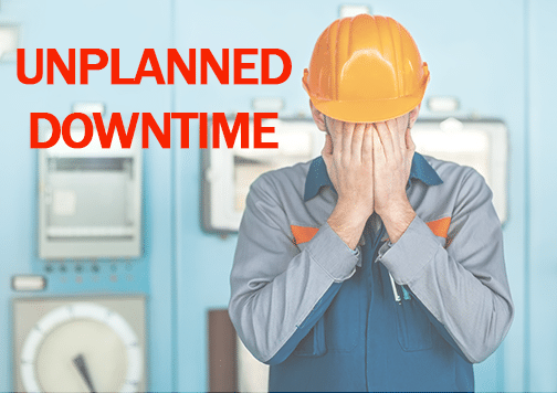 Worker in orange hat stressed because of unplanned downtime Worker in orange hat stressed because of unplanned downtime
