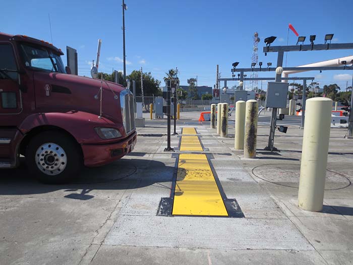 Intercomp weigh in motion truck scales installed in existing vehicle lanes Intercomp weigh in motion truck scales installed in existing vehicle lanes