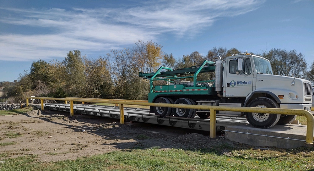 Michelli heavy duty test truck performs truck scale calibration Michelli Weighing & Measurement heavy duty test truck is used to perform truck scale calibration