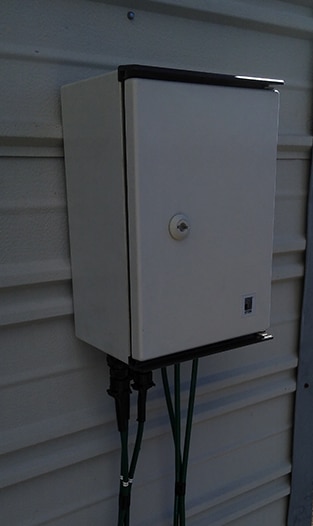 Weather-proof junction box Weather-proof junction box helps protect scales from rain