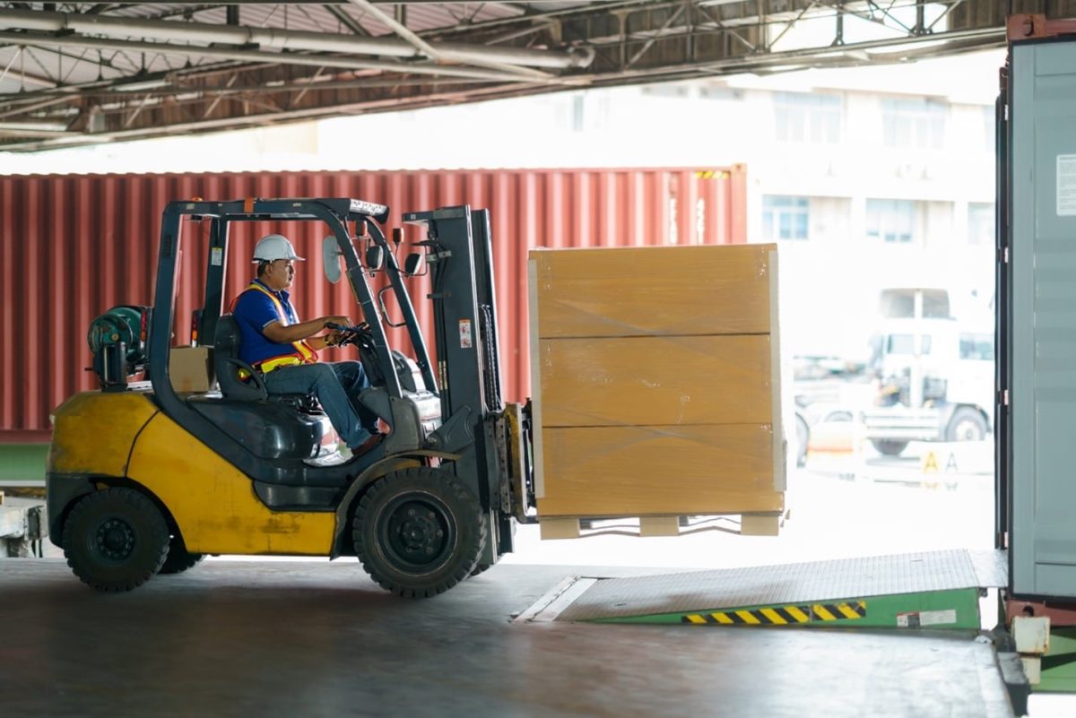 Avery Weigh-Tronix forklift scale in use loading container