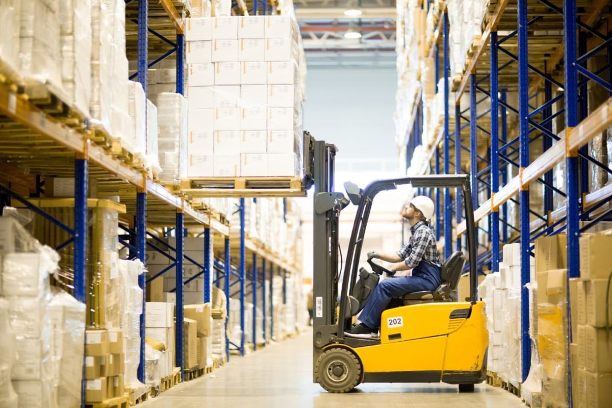 Forklift in use in factory Forklift in use in factory