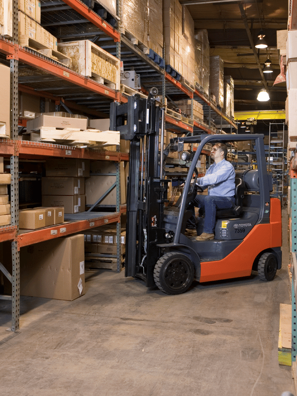 Forklift operator uses an Avery Weigh-Tronix forklift scale