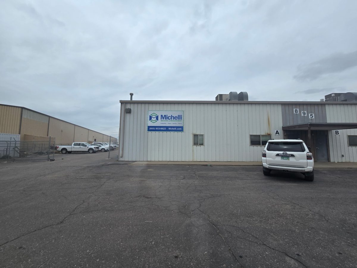 1000026136 View of Denver Colorado skyline with a Michelli Weighing & Measurement overlay